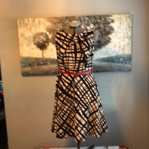 A line dress black and blush/taupe with red patent leather belt